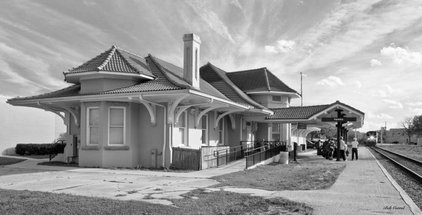 photo of Palatka Train Station with passenger train arriving, black & white