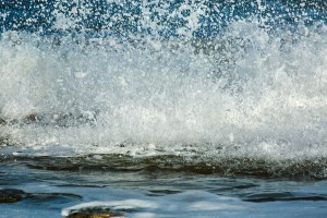 photo of wave coming ashore